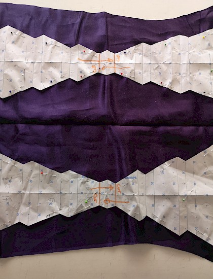 Laying out a complex pattern on silk hemp fabric